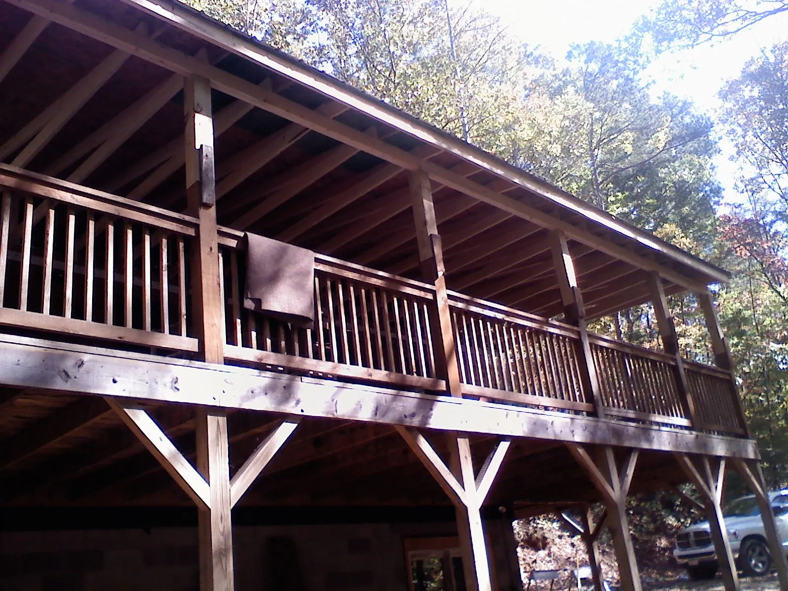 Timber framing under a new elevated porch and deck — Roof Leak Repair in Gardner by Roofing Brothers